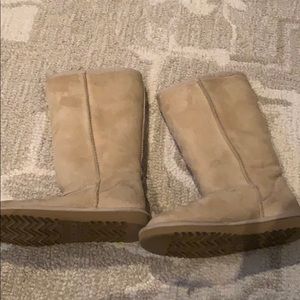 Pair of ugg classic tall beige boots
